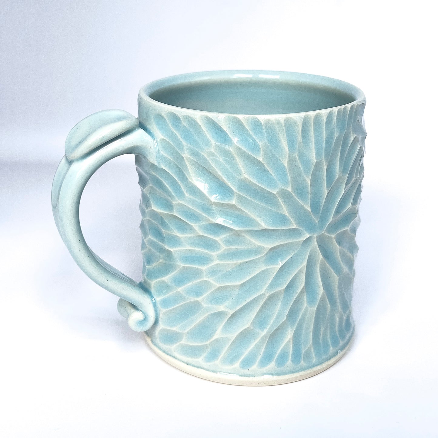 14 ounce carved porcelain mug, glacier celadon glaze #1