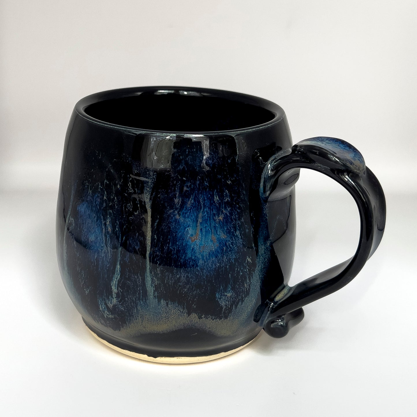 16 ounce rounded mug, deep space running glaze #1